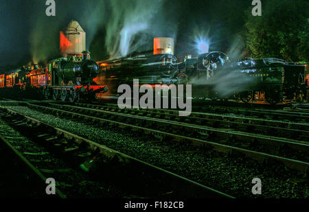 Night scene at Bewdley on the SVR. LMS Jubilee class 5690 Leander departing, 3717 City of Truro, GWR 0-6-0 3205, standing Stock Photo