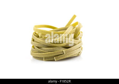 dry green nest pasta isolated on white background Stock Photo