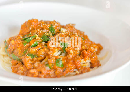 Spaghetti with minced meat and vegetables , tomato sauce Stock Photo