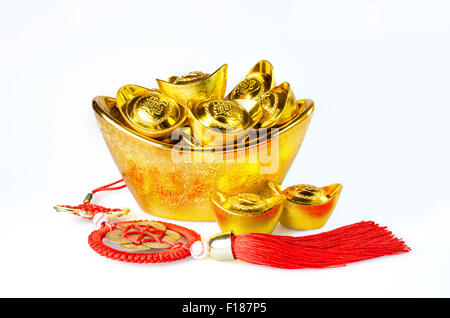 Chinese gold ingots (Foreign text means blessing) decoration isolated on white background Stock Photo