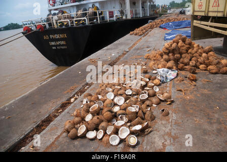 Sun-dried coconuts at harbor. © Anastasia Ika Stock Photo