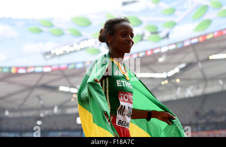 Beijing, China. 30th Aug, 2015. Mare Dibaba of Ethiopia celebrates winning the women's marathon final at the 2015 IAAF World Championships in Beijing, capital of China, Aug. 30, 2015. © Li Gang/Xinhua/Alamy Live News Stock Photo