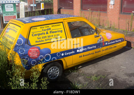 Yellow Reliant Robin 3 wheel van a tribute to the Trotters Independent Trading one in the TV comedy Only Fools and Horses Stock Photo