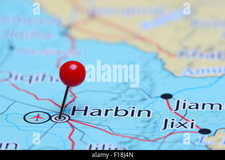 Harbin pinned on a map of Asia Stock Photo