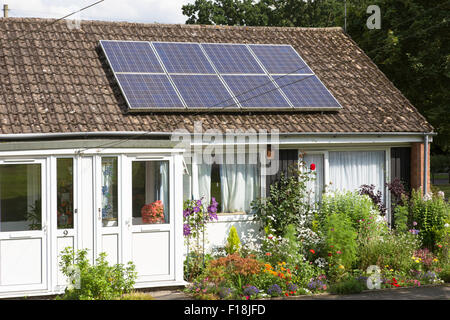 Solar panels on retirement bungalows, England, UK Stock Photo