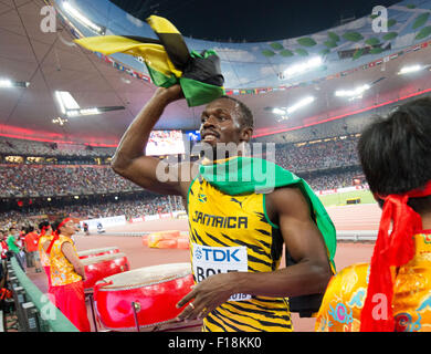 Beijing, China. 29th Aug, 2015. Jamaica's Usain Bolt celebrates after winning the men's 4x100m relay final during the Beijing 2015 IAAF World Championships at the National Stadium, also known as Bird's Nest, in Beijing, China, 29 August 2015. The Jamaican team won the gold medal. Credit:  dpa picture alliance/Alamy Live News Stock Photo