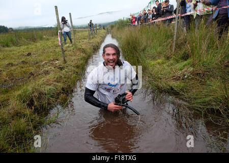 Llanwrtyd Wells, Powys, Wales, UK. 30th August, 2015.  Joels Hicks from Leicester was this years first competitor at the 30th World Bog Snorkelling Championship being held in two water filled boggy trenches in Mid Wales. Stock Photo