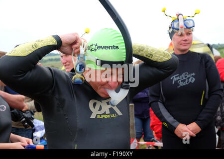 Llanwrtyd Wells, Powys, Wales, UK. 30th August, 2015.  A competitor prepares for this years 30th World Bog Snorkelling Championship which is held in two water filled boggy trenches in Mid Wales. Stock Photo