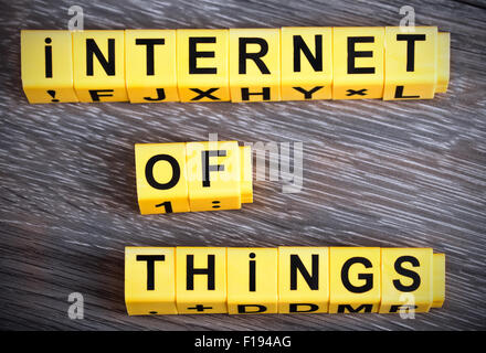 Internet of Things sign on wood background Stock Photo