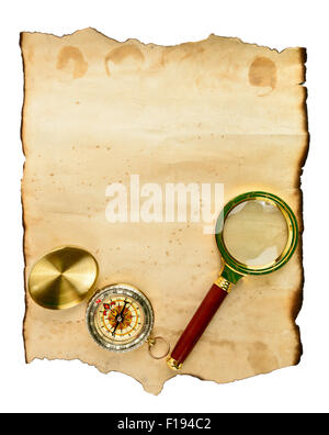 Old grunge blank paper sheet with compass and glass Stock Photo