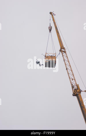 Blackpool, UK. 30th August, 2015. A cloudy morning in Blackpool but the conditions are almost perfect for the 'Base jumpers' taking their leap of faith off a 320 foot high crane on Blackpool's beach. Credit: Gary Telford/Alamy live news Stock Photo