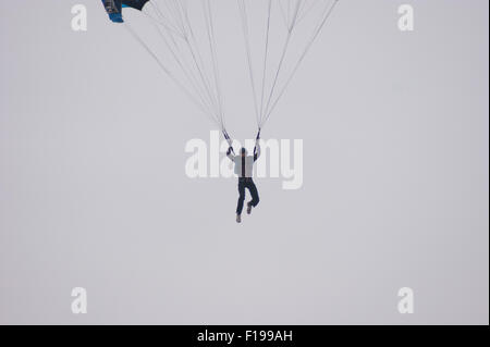 Blackpool, UK. 30th August, 2015. A cloudy morning in Blackpool but the conditions are almost perfect for the 'Base jumpers' taking their leap of faith off a 320 foot high crane on Blackpool's beach. Credit: Gary Telford/Alamy live news Stock Photo