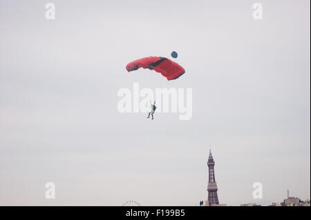 Blackpool, UK. 30th August, 2015. A cloudy morning in Blackpool but the conditions are almost perfect for the 'Base jumpers' taking their leap of faith off a 320 foot high crane on Blackpool's beach. Credit: Gary Telford/Alamy live news Stock Photo