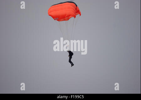 Blackpool, UK. 30th August, 2015. A cloudy morning in Blackpool but the conditions are almost perfect for the 'Base jumpers' taking their leap of faith off a 320 foot high crane on Blackpool's beach. Credit: Gary Telford/Alamy live news Stock Photo