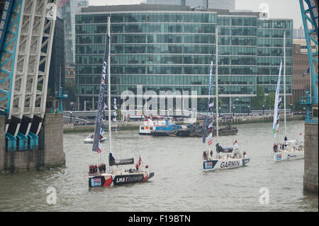 St Katharine Docks, London, UK. 30th August, 2015. The Clipper Round the World Yacht Race starts with the fleet of ocean racing yachts passing under iconic Tower Bridge in central London to begin a 40,000 nautical mile trip. Credit:  Malcolm Park editorial/Alamy Live News Stock Photo