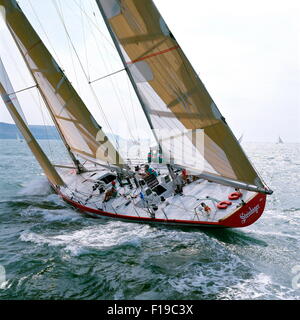 AJAXNETPHOTO. 1989. SOLENT, ENGLAND. FASTNET RACE 1989 - STEINLAGER II / SKIPPER : PETER BLAKE (NZL) OFF THE NEEDLES. YACHT IS A WHITBREAD RACE ENTRY. PHOTO : JONATHAN EASTLAND / AJAX Stock Photo