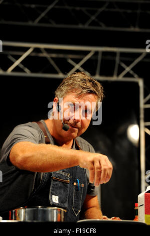 Bolton, UK. 30th Aug, 2015. The 10th annual Bolton Food and Drink Festival, Victoria Square, Bolton, Lancashire. Masterchef's John Torode during his cookery demonstration. Credit:  Paul Heyes/Alamy Live News Stock Photo