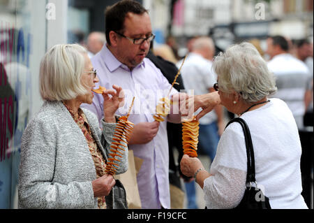Bolton, UK. 30th Aug, 2015. The 10th annual Bolton Food and Drink Festival, Victoria Square, Bolton, Lancashire. Lunch time for these visitors. Credit:  Paul Heyes/Alamy Live News Stock Photo