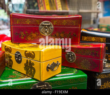 Colorful laquered boxes for sale on Chongde Rd in the Dongtai flea market in Shanghai, China Stock Photo