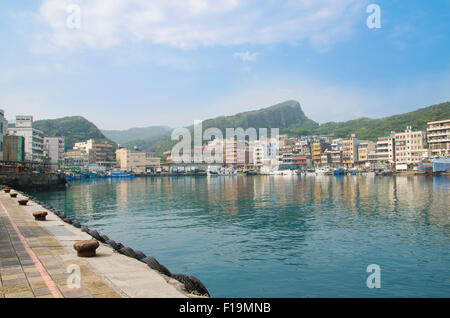 Yehliu Fishing Harbor in the City Wanli , it is just next to Yehliu Geopark,Taiwan Stock Photo