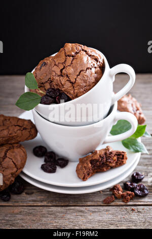 Chocolate walnut cherry cookies in coffee cups Stock Photo