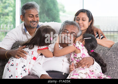 Portrait of multi generations Indian family at home. Asian people living lifestyle. Stock Photo