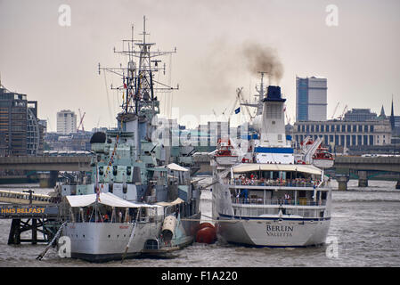 HMS Belfast is a museum ship, originally a Royal Navy light cruiser, permanently moored in London on the River Thames Stock Photo