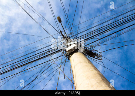 Lamp post with many cables that run in different directions Stock Photo