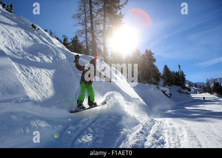 Krippenbrunn, Austria, a boy snowboarding in deep snow Stock Photo