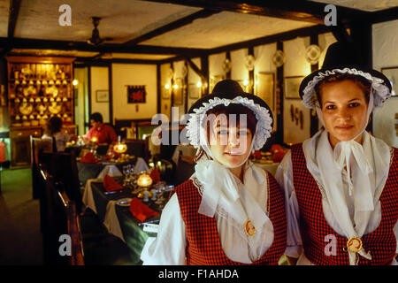 Traditionally dressed waitresses in a Welsh restaurant. Wales. Stock Photo