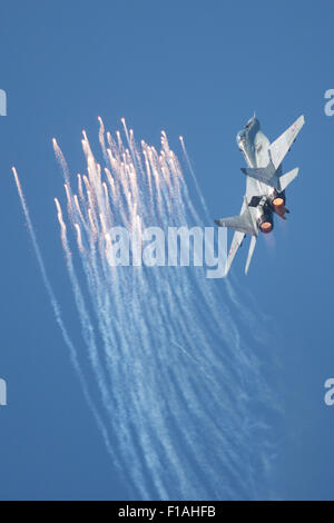 Sliac, Slovakia. 30th August, 2015. MiG-29AS of Slovak Air Force releases flares at SIAF airshow in Sliac, Slovakia on August 30, 2015 Credit:  Lubos Paukeje/Alamy Live News Stock Photo