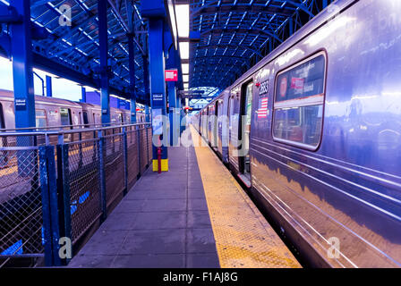 New York City, USA, New York Subway Train in Station in Brooklyn  at Empty Platform Stock Photo