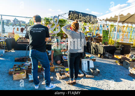 New York City, USA, Clothes Shopping in Vintage Street Flea Market, DUMBO Neighborhood, Brooklyn District, Street Vendor, couple Rear, vintage market Stock Photo