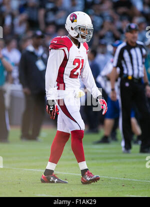 Arizona Cardinals cornerback Patrick Peterson, middle, pauses with ...