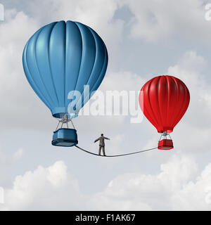 Change challenge and caution business motivational concept as person walking on a tight rope high wire from one hot air balloon Stock Photo