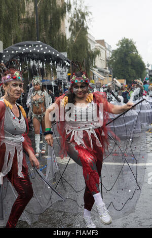 Notting Hill, UK. 31st August, 2015. Notting Hill carnival parade got underway despite heavy rainfall. Credit:  Keith Larby/Alamy Live News Stock Photo