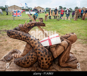 Cheshire, UK. 31st Aug, 2015. Lorraine Botterill's carving of George and the Dragon at The 11th English Open Chainsaw Carving Competition held at the Cheshire Game and Country Show at the Cheshire County Showground Credit:  John Hopkins/Alamy Live News Stock Photo