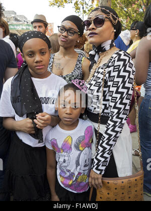 Mother and daughters at Spike Lee block party in the Bedford Stuyvesant section of Brooklyn, NY, Aug. 29, 20015. Stock Photo