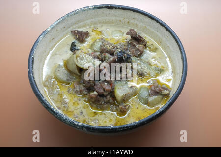 Thai green curry soup with beef and coconut milk Stock Photo