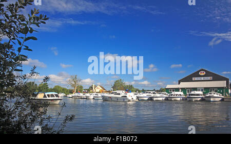 A view of boats on the River Bure on the Norfolk Broads at Horning, Norfolk, England, United Kingdom. Stock Photo