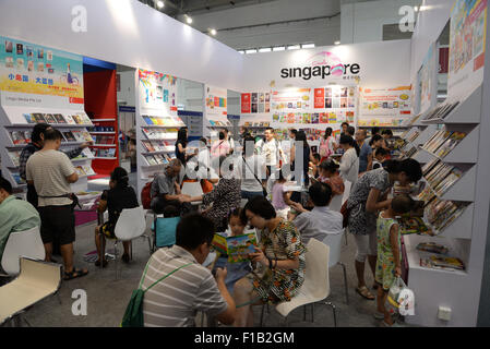 Xiaogan, CHN, Hubei. 29th Aug, 2015. Xiaogan, CHINA - August 29 2015: (EDITORIAL USE ONLY. CHINA OUT) August 29 was the first Public Open Day of Beijing International Book Exhibition. 82 countries and areas attend it, 2270 book sellers, both decreased by 5%. As one of the four famous book exhibitions as Frankfurt, London and American VEA exhibition, it's becoming more and more influential, and 1305 oversea publishers from Britain, France, America, Korea, Japan, India attend it, decreased by 6.3% © SIPA Asia/ZUMA Wire/Alamy Live News Stock Photo