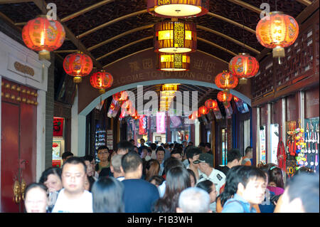 People in passage of Yu Yuan Old Street, Shanghai, China Stock Photo