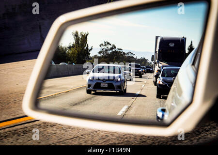 Rush hour traffic in the rear view mirror Stock Photo