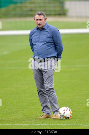 Wolfsburg, Germany. 1st Sep, 2015. Wolfsburg's Manager Klaus Allofs watches a practice session of the team in the Volkswagen-Arena, in Wolfsburg, Germany, 1 September 2015. PHOTO: PETER STEFFEN/dpa/Alamy Live News Stock Photo