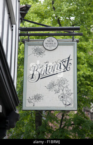 british pub sign for the botanist, on kew green adjacent to kew gardens ...