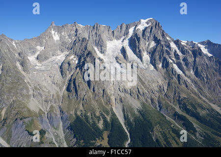 AERIAL VIEW. Dent du Géant (left, 4013 meters asl) and the Grandes Jorasses (right, 4208 meters asl). Val Ferret, Courmayeur, Aosta Valley, Italy. Stock Photo