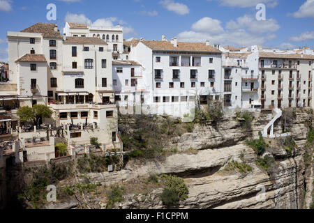 Cliff houses in city of Ronda - Pueblo Blanco - White Town in Andalusia, Spain Stock Photo