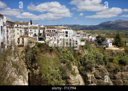 Cliff houses in city of Ronda - Pueblo Blanco - White Town in Andalusia, Spain Stock Photo