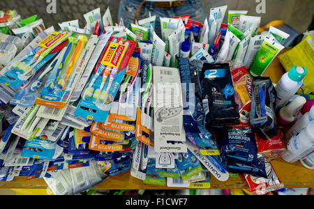 Munich, Germany. 1st Sep, 2015. Donated toothbrushes and toothpaste, along with other items at the central train station in Munich, Germany, 1 September 2015. Due to the large numbers of refugees, many citizens are bringing donations to the station. PHOTO: SVEN HOPPE/DPA/Alamy Live News Stock Photo