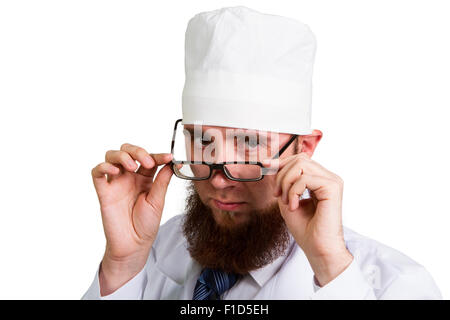 Studio portrait of a young bearded doctor in glasses  Isolated on white background Stock Photo